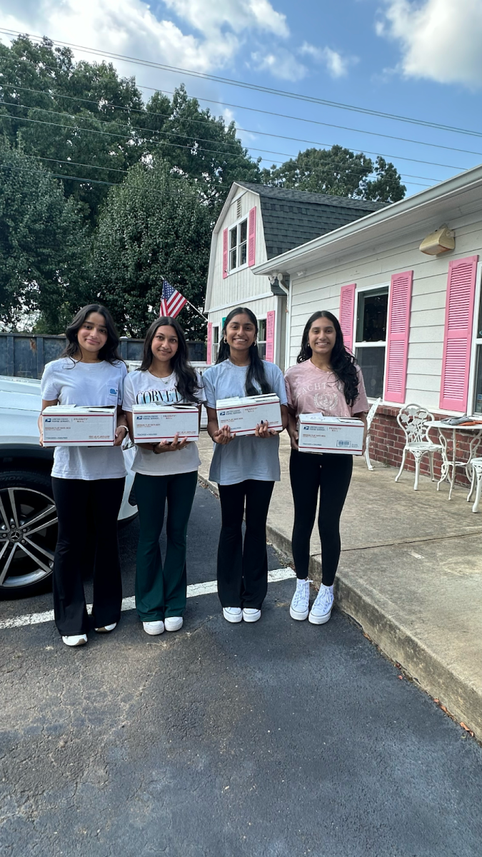 
Akshaya Kondamuri, Tia Gupta, Anvi Vulavala and Anya Baddam giving care packages at Bethany’s Place (Photo courtesy of Tia Gupta)