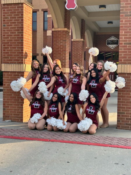 (Lambert Dance team taking pictures outside of Lambert High School. Courtesy of Lambert High School)