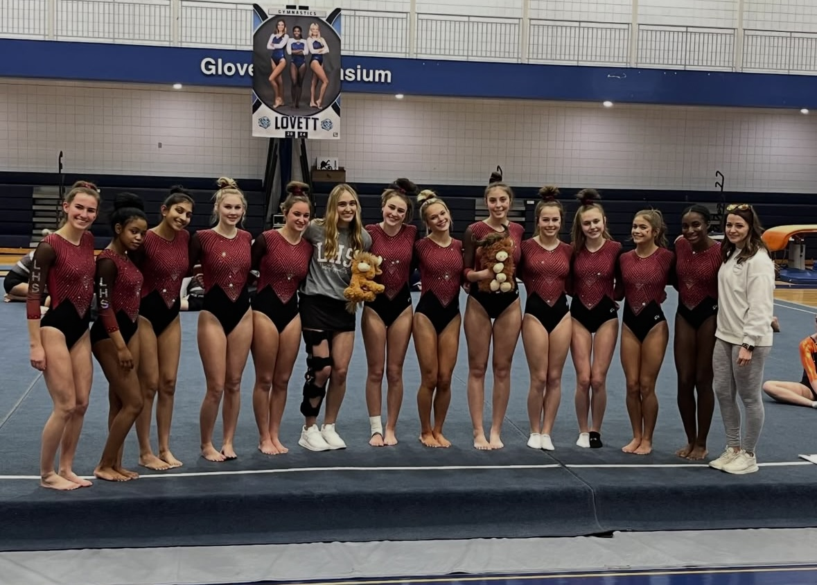  Lambert Gymnastics 2023-2024 team at the county meet before their first place win. (Katelyn Gallagher)