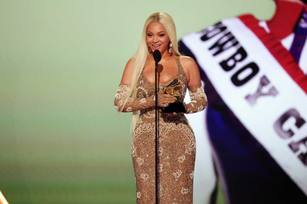 A picture of Beyonce winning Album of The Year for “Cowboy Carter.” (Kevin Winter/Getty Images)