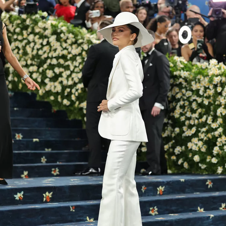 Actress Zendaya wearing a tailored Louis Vuitton suit to the 2025 Met Gala (Cosmopolitan).