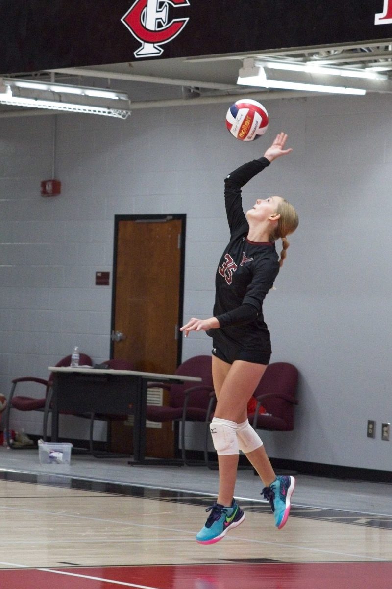 Vanogothem serves the ball at the game against Forsyth Central (Robert G. Pierlott III).


