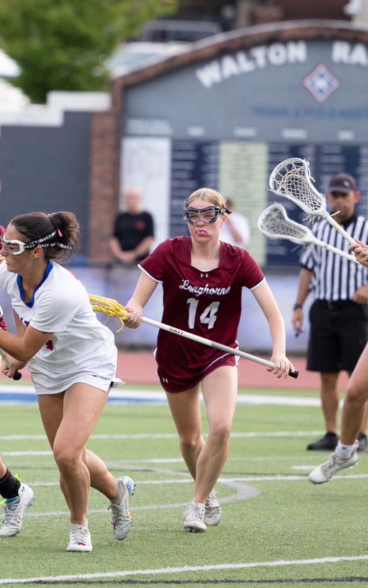 Tessa Sosnin running down the field (Photo Craig J(CJ) LaCava).