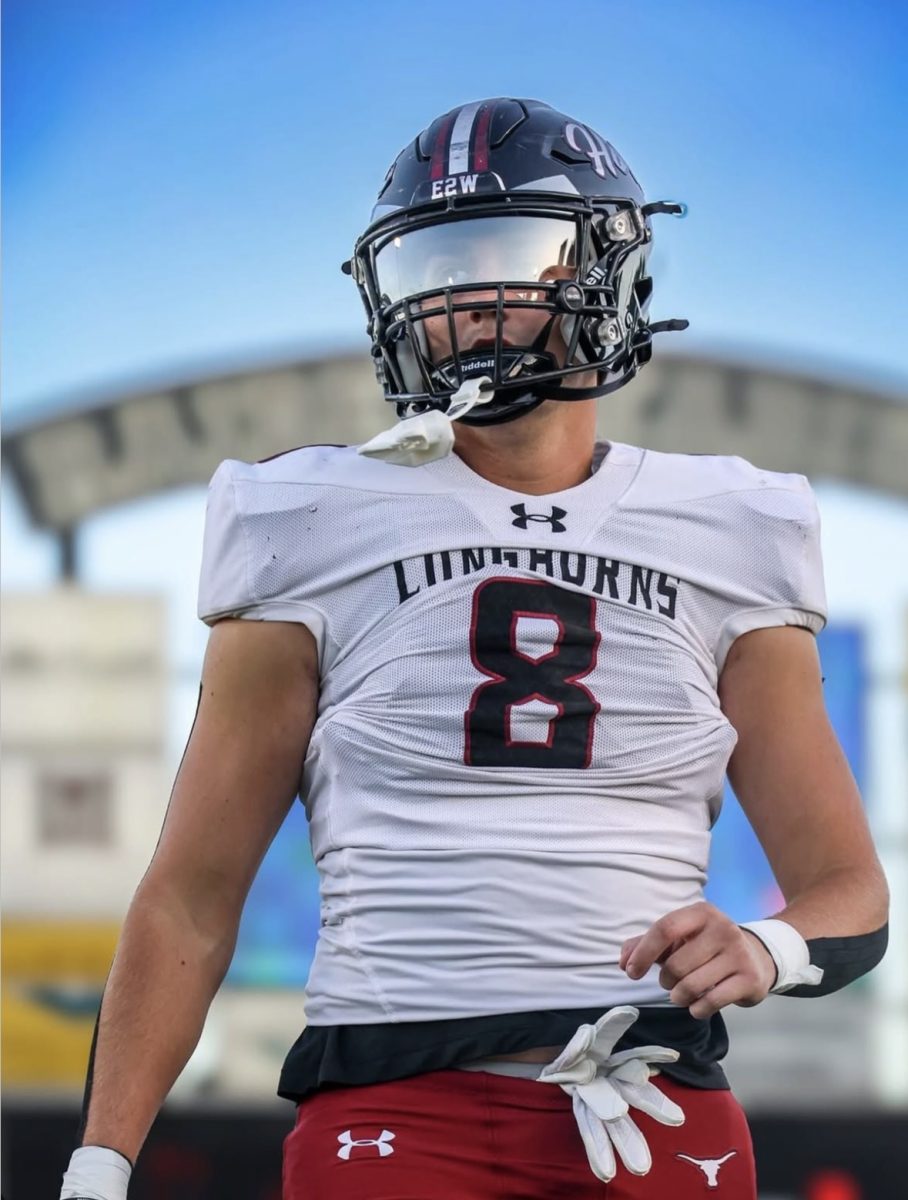 Bryce Flynt playing football for Lambert (Lambert Football).
