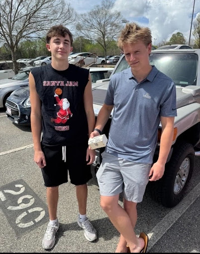 Ryder Grinnell and Isaac Rodriguez with their winnings (Isaac Rodriguez). 

